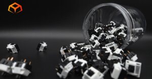 Close up shot of Akko Piano Pro switches spilling from a jar