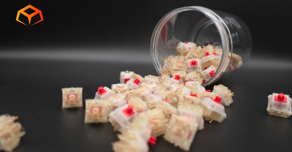 Close up shot of Gateron Cream Soda switches spilling from a jar