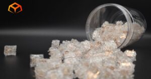 Close up shot of Everglide Aqua King switches spilling from a jar