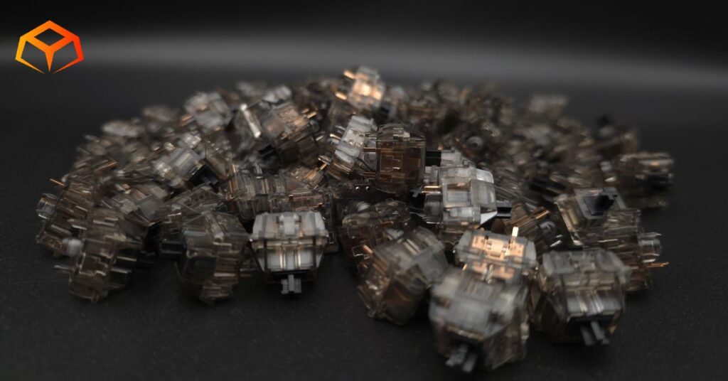 Macro shot of Gateron Ink Black switches piled on top of each other