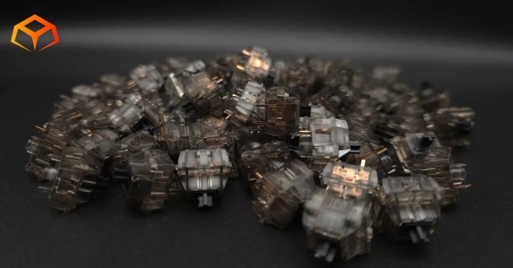 Macro shot of Gateron Ink Black switches piled on top of each other