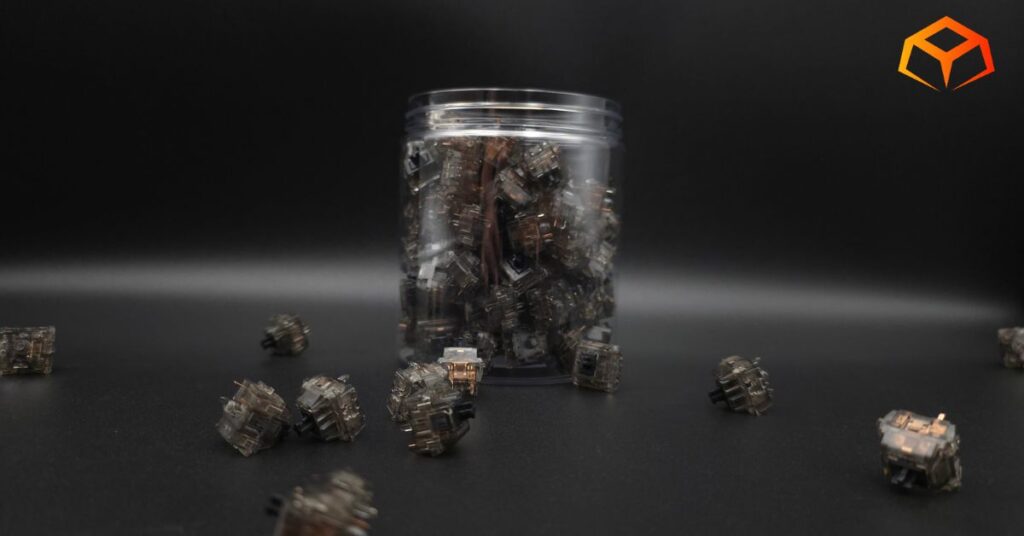 Close up shot of Gateron Ink Black switches in a jar