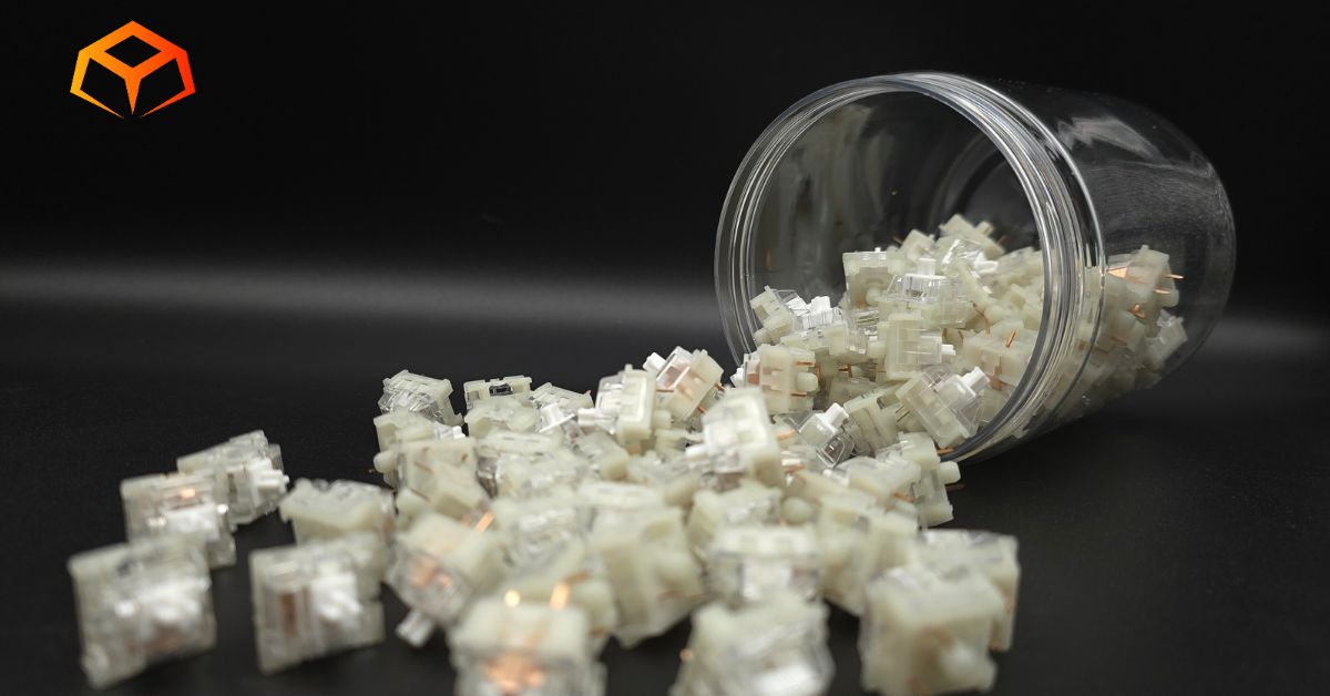 Close up shot of KTT Kang White switches spilling from a jar
