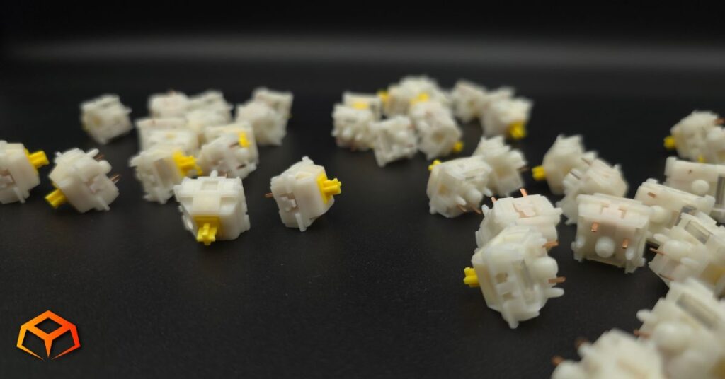 Close up shot of Gateron Milky Yellow Pro V3 switches spread out