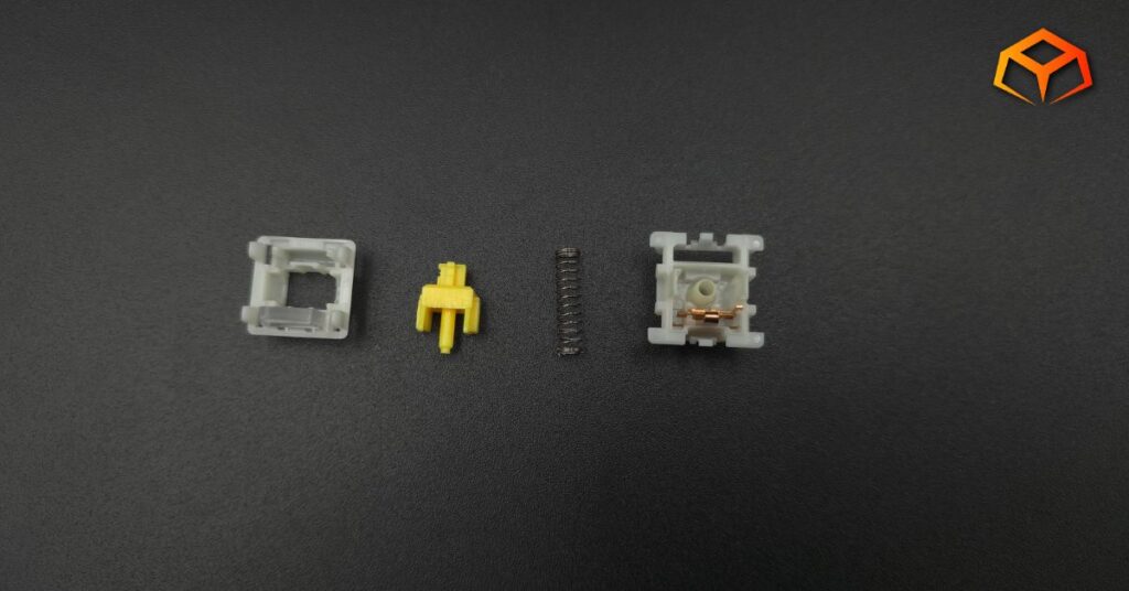 Close up shot of a Gateron Milky Yellow Pro V3 switch disassembled